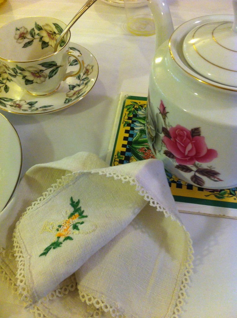 Afternoon tea, teapot, embroidered napkin