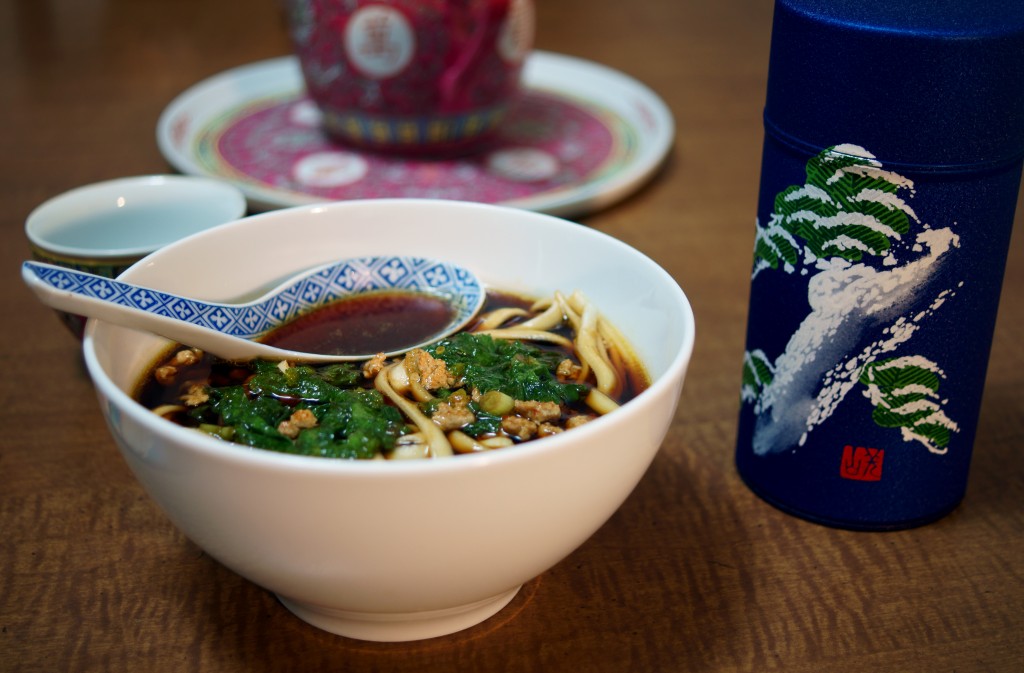 Spicy pork soup with mustard greens