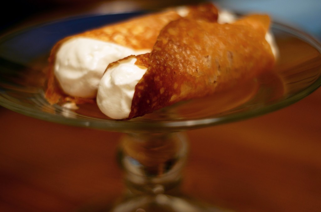 Brandy snaps with whipped cream