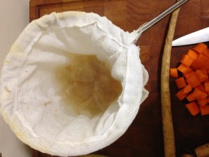 Draining the Dashi Using a Fine Mesh Cheesecloth