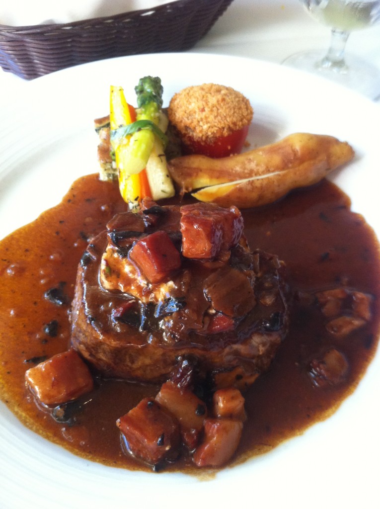 Filet Mignon with Red Wine Sauce, Blue Cheese, Pancetta, and Candied Pecans Served at Pisces in 2011