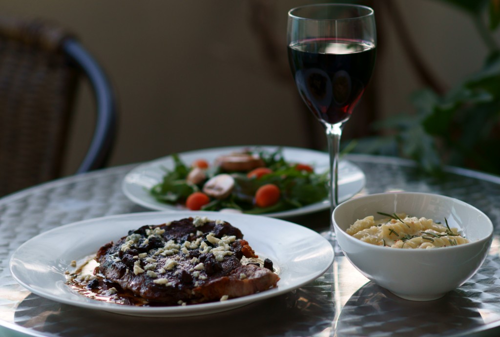 Ribeye Steaks with Red Wine Sauce, Blue Cheese, Pancetta, and Candied Pecans