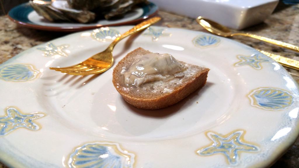 An Oyster atop a Slice of Buttered, Rye Bread