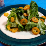 Chopped Romaine Lettuce Dressed with a Classic French Dijon Vinaigrette and Sliced Kumquats