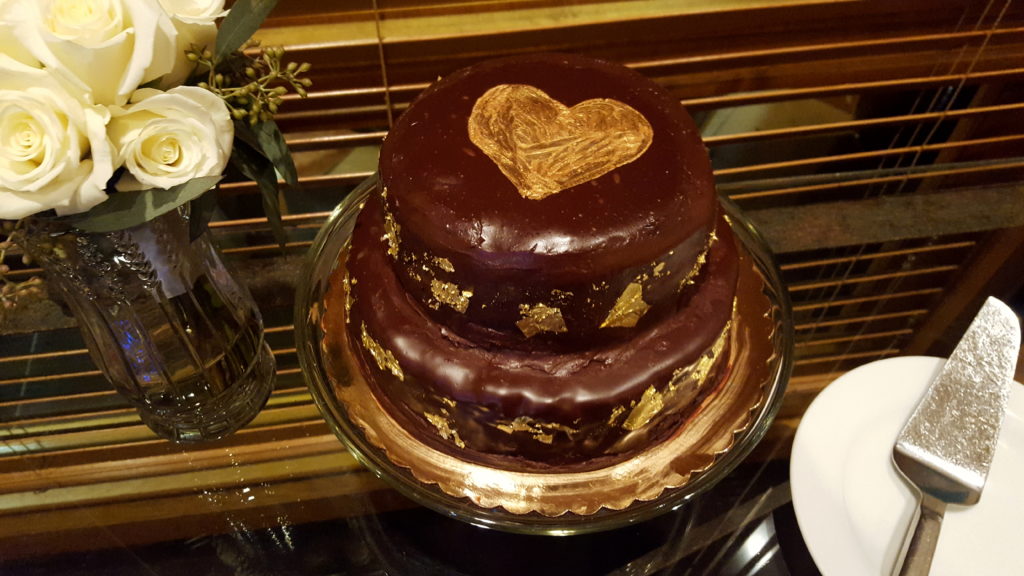 The Assembled Chocolate Raspberry Truffle Cake with Edible Gold