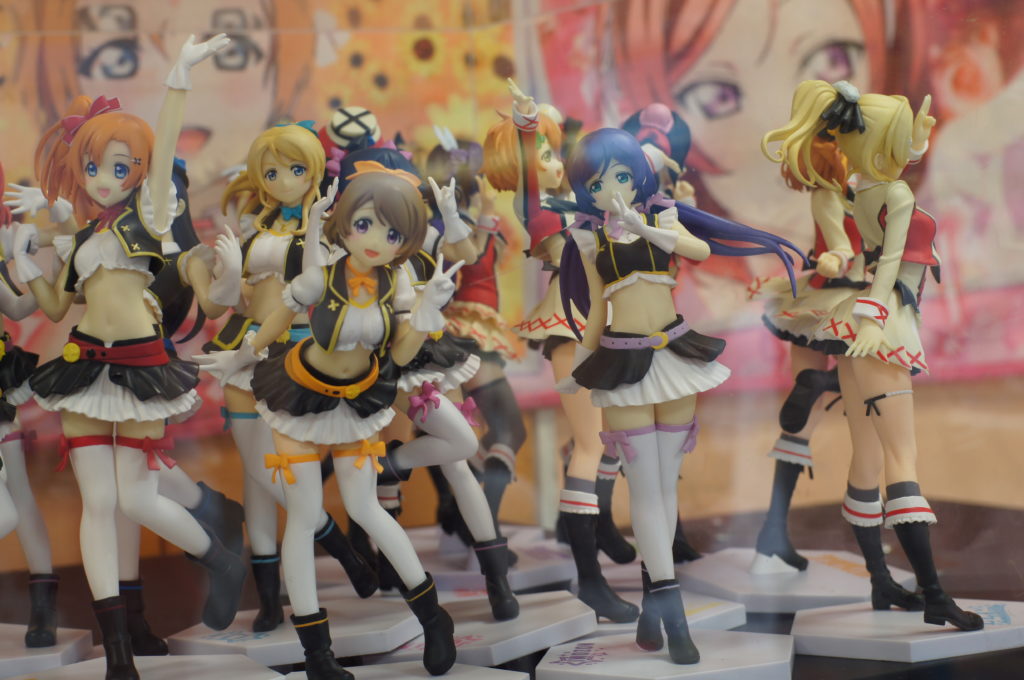 Anime Figurines in Arcade Display Case