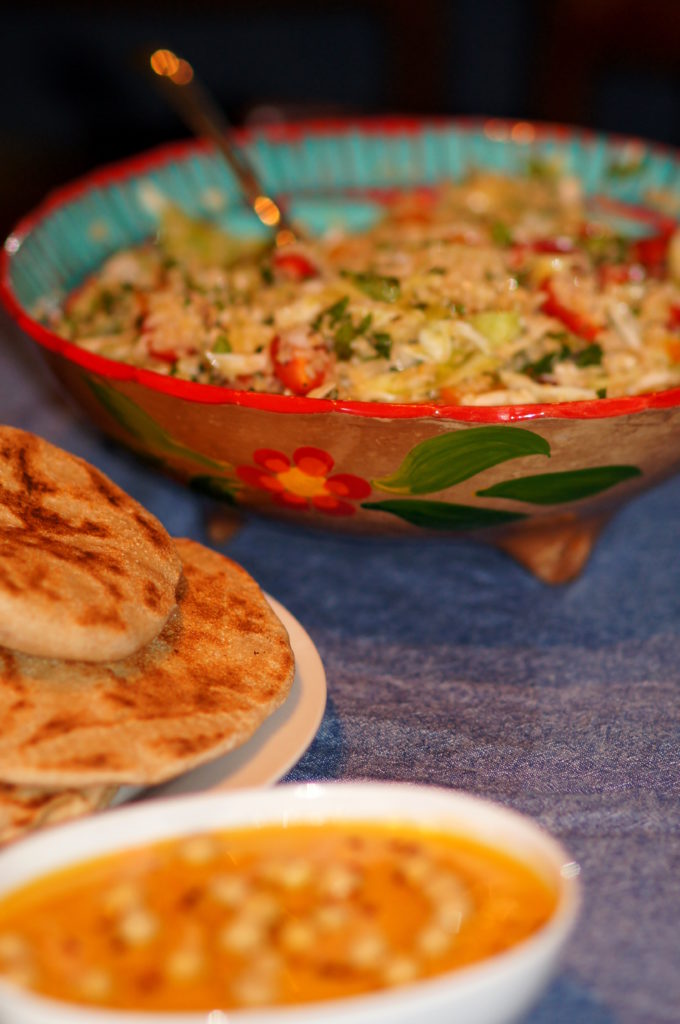 Harrisa Hummus, Fresh Pitas, and Cabbage Tabouleh with Baharat Seasoning