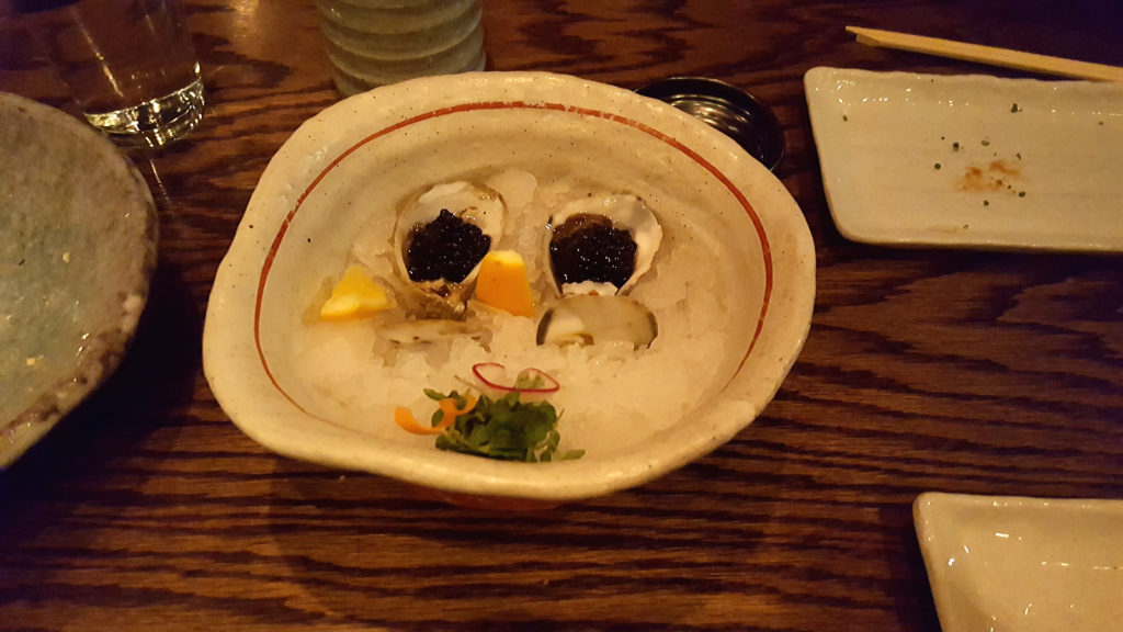 Mini Oysters with Sturgeon Caviar and Meyer Lemon at Raku Restaurant