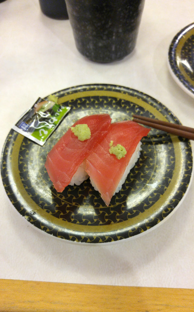 Plate of Tuna Nigiri with Wasabi at Hamazushi Restaurant