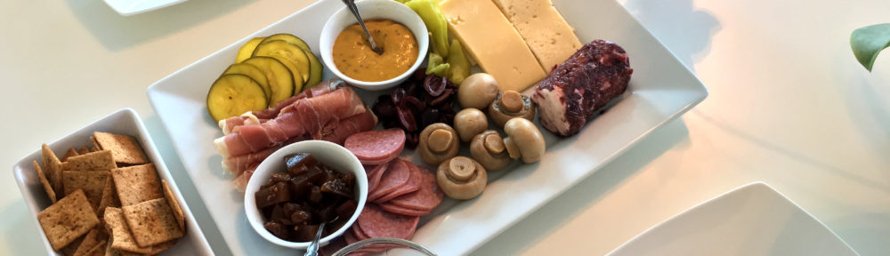Charcuterie and Cheese Board with Pickled Vegetables and Apple Chutney