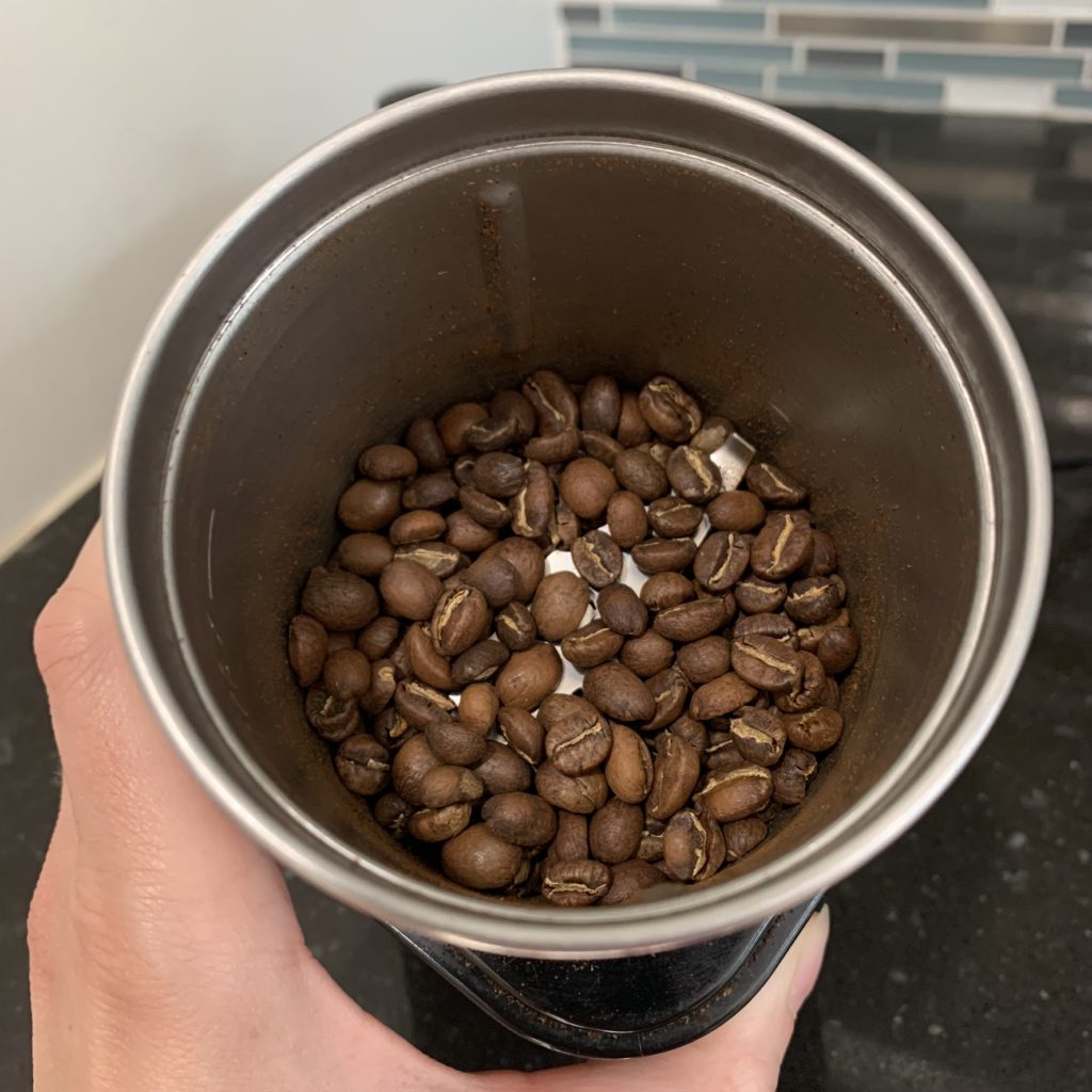 Whole Espresso Beans in Coffee Grinder
